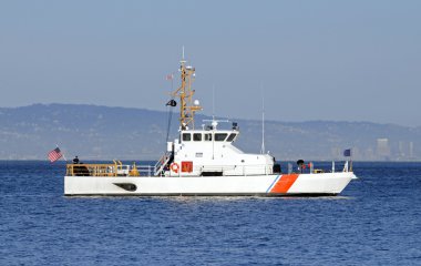 US Coast Guard anchored in the bay clipart