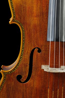 Cello on a black background clipart