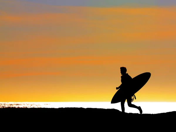 Surfare som kör till havet — Stockfoto