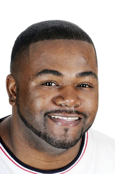 Fiatal afroamerikai férfi mosolyogva — Stock Fotó