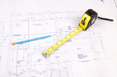 Building plans and tape measure clipart