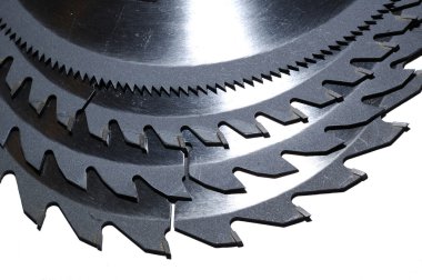 A nest of Circular saw blades of different sized teeth clipart