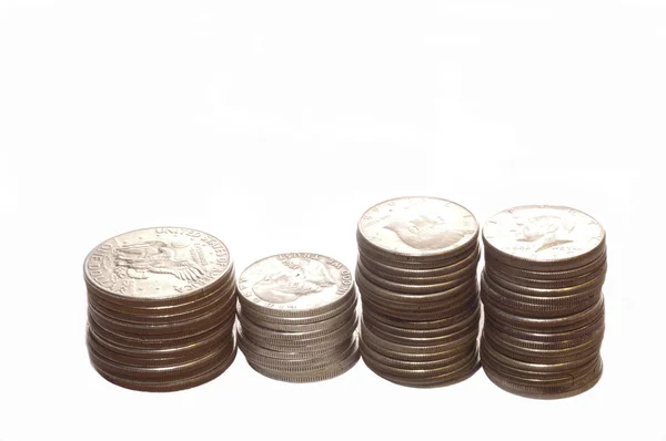 Travar av dollarn och halv dollar mynt — Stockfoto