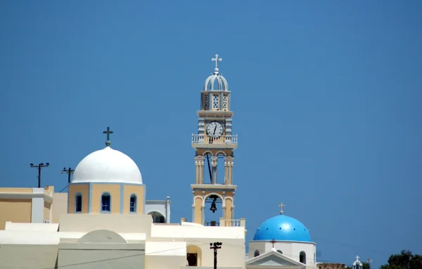 Bell tower with clock and dome on the greek island of Santorini — Stock Photo, Image