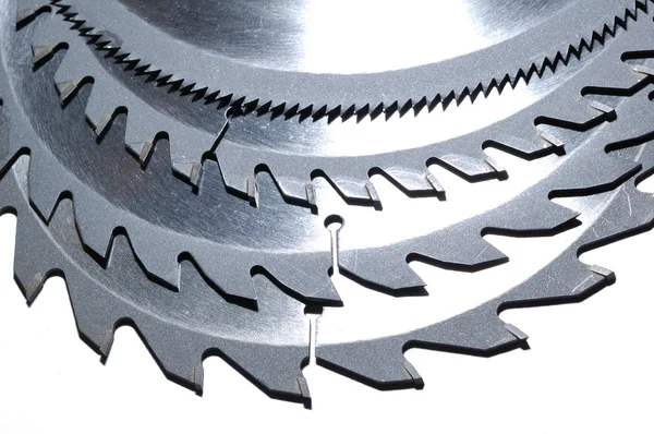 A nest of Circular saw blades of different sized teeth — Stock Photo, Image