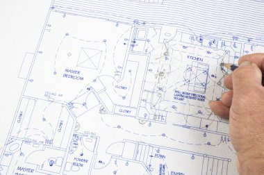 Architect making changes to plans clipart