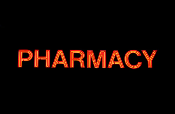 Neon jel-val a szó "gyógyszertári" fekete felett — Stock Fotó
