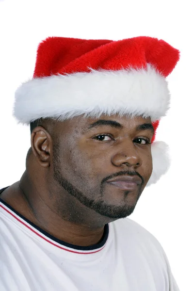 Jovem afro-americano com um chapéu de Pai Natal — Fotografia de Stock