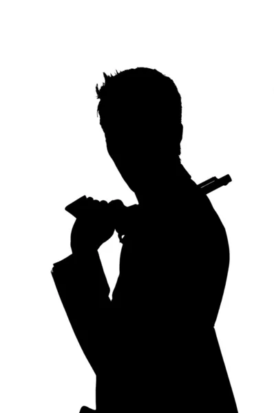 Silhouette of man with gun — Stock Photo, Image