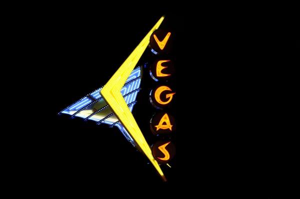 Signo de neón con la palabra "Vegas" sobre negro — Foto de Stock