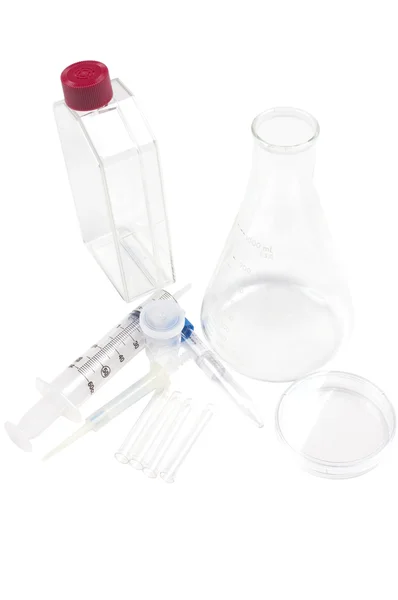 Medical measuring flasks, dishes and syringes — Stock Photo, Image