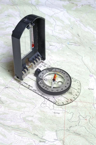 Closeup of compass and map