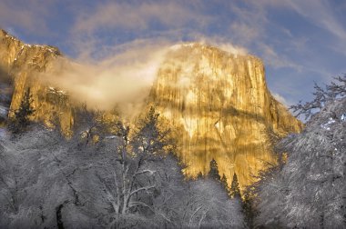 Sunset on the granite peaks in Yosemite valley clipart