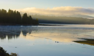 Misty morning on Lake Almanor clipart