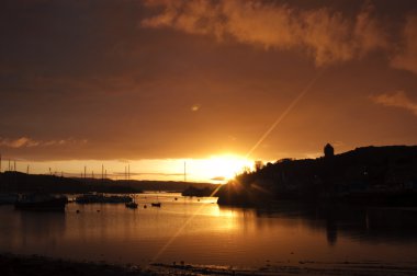 Tarbert harbor in the morning clipart