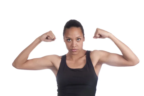 Linda mulher afro-americana flexionando músculos — Fotografia de Stock