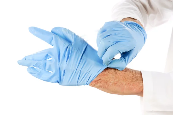Putting on gloves — Stock Photo, Image