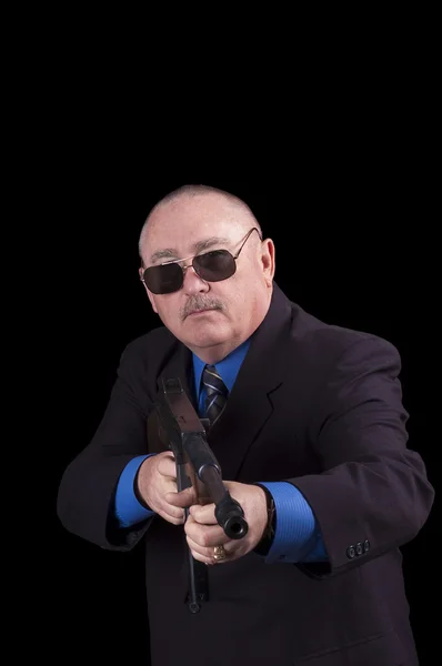 Gangster oder Regierungsagent, FBI-Agent, vor schwarzem Hintergrund — Stockfoto