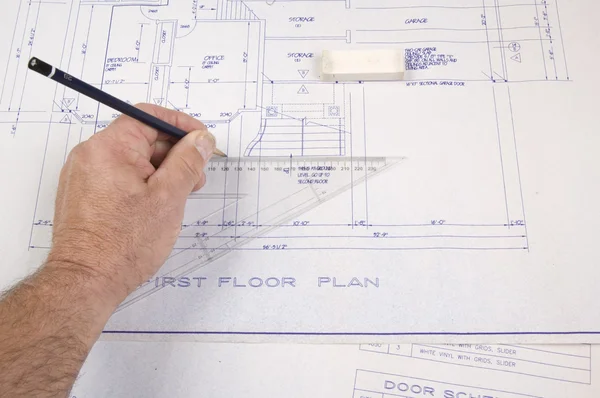 Architect, drawing up plans for a house — Stock Photo, Image