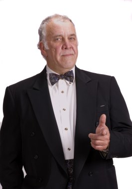 Older businessman impersonating James Bond clipart