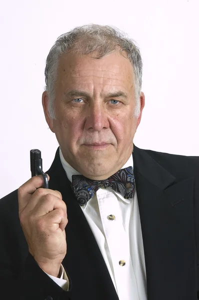 Starsze biznesmen personifikacji Jamesa Bonda — Zdjęcie stockowe