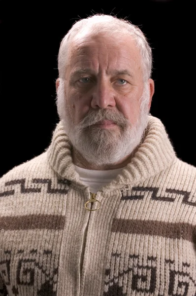 Old man with beard in sweater like Ernest Hemingway — Stock Photo, Image