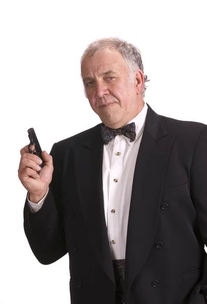Homem de negócios mais velho que se faz passar por James Bond — Fotografia de Stock
