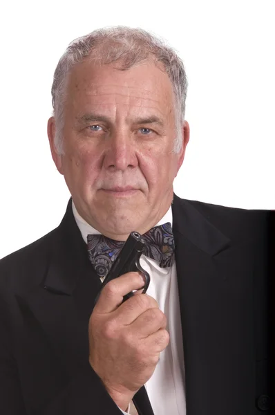 Older businessman with gun - james bond impersonation LOL — Stock Photo, Image
