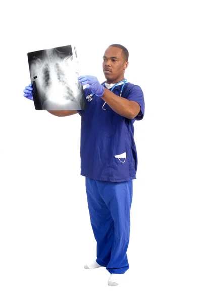 African American Doctor checking x-ray isolated over white — Stock Photo, Image