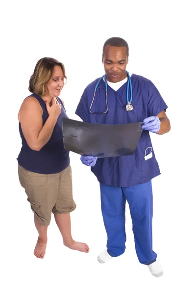 Doctor discussing x-ray — Stock Photo, Image