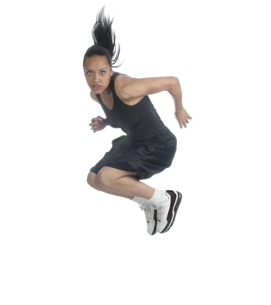 Vacker afroamerikanska kvinna hoppar — Stockfoto