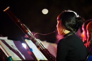 Korean Woman Symphany Orchestra Bassoon clipart