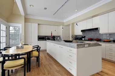 Kitchen with white cabinetry clipart