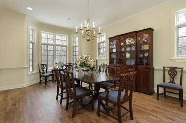 Diningroom with cream colored walls clipart