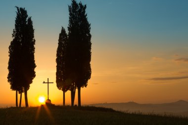 Holy sunrise in Tuscany clipart