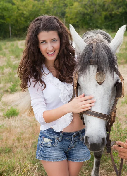 Woman and horse friendship — Stock Photo, Image