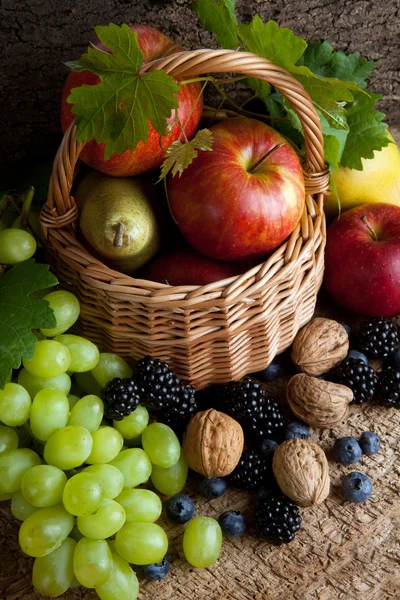 Autumn foods in a basket — Stock Photo, Image