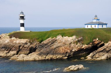 The Pancha island lighthouse, Galicia (Spain) clipart