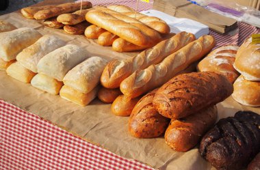Fresh Breads At An Outdoor Market clipart