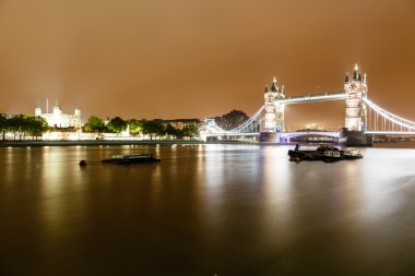 Tower Brifge and Tower of London in the Rainy Night, United King clipart