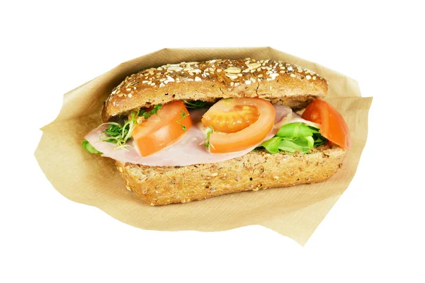 Braunes Sandwich mit Tomaten, Salat und Senfsauce. — Stockfoto