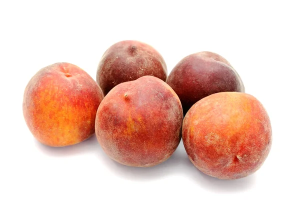 Пять персиков — стоковое фото