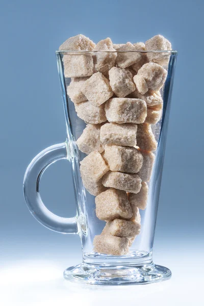 Glass of brown sugar — Stock Photo, Image
