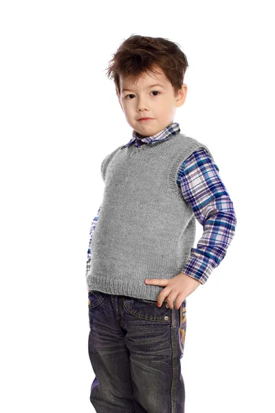 Young European children on white background in a knitted sweater — Stock Photo, Image