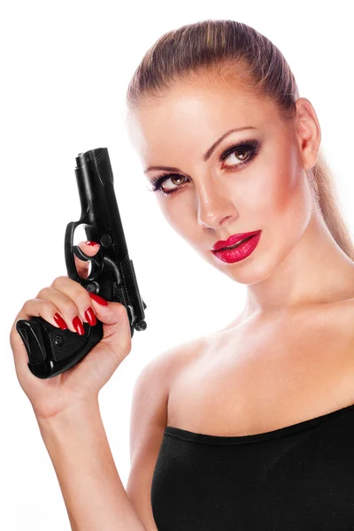 stock image Young beautiful woman holding a gun