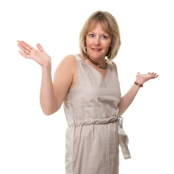 Aantrekkelijke lachende volwassen vrouw hand in hand omhoog in verrassing Stockfoto