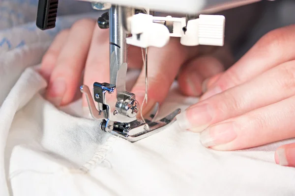 stock image Hand sewing on a machine