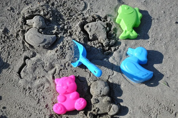 Toys in the sand. — Stock Photo, Image