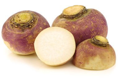 Fresh turnips and a cut one clipart