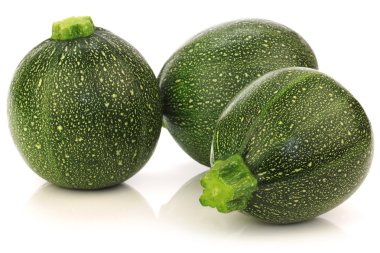 Three fresh Round Zucchini's clipart